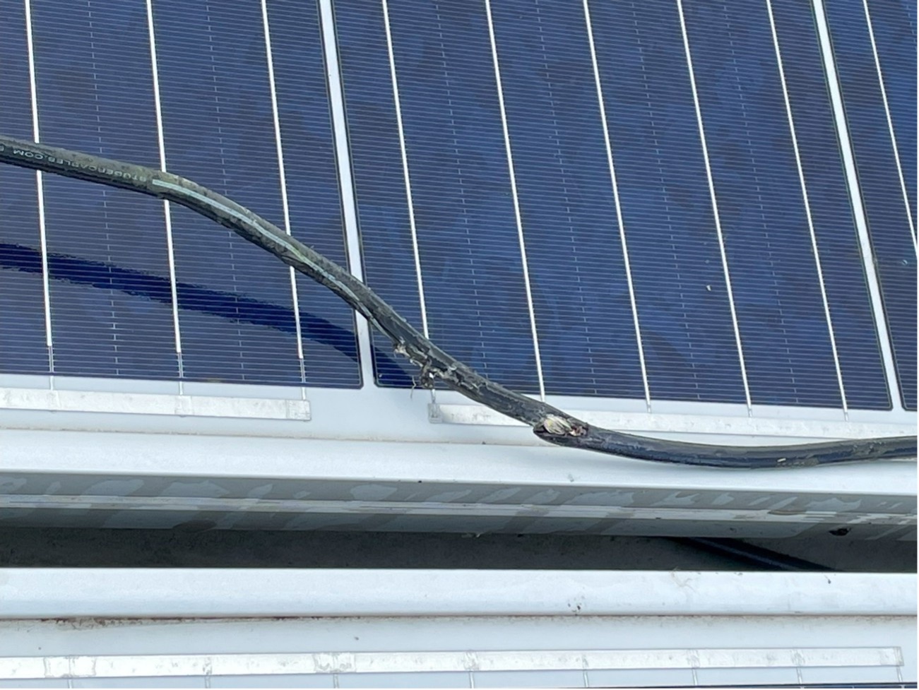 crooked wire across solar panel 