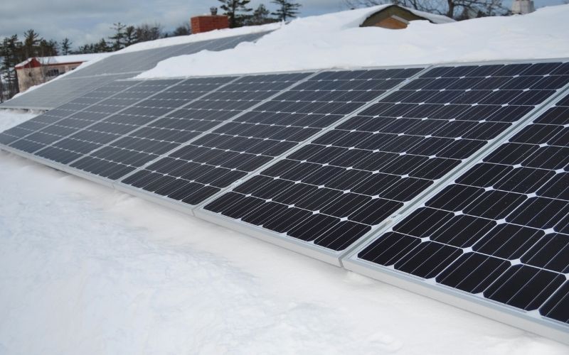 snow on rooftop panels