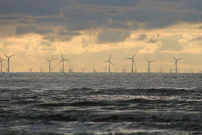 cloudy ocean wind turbines