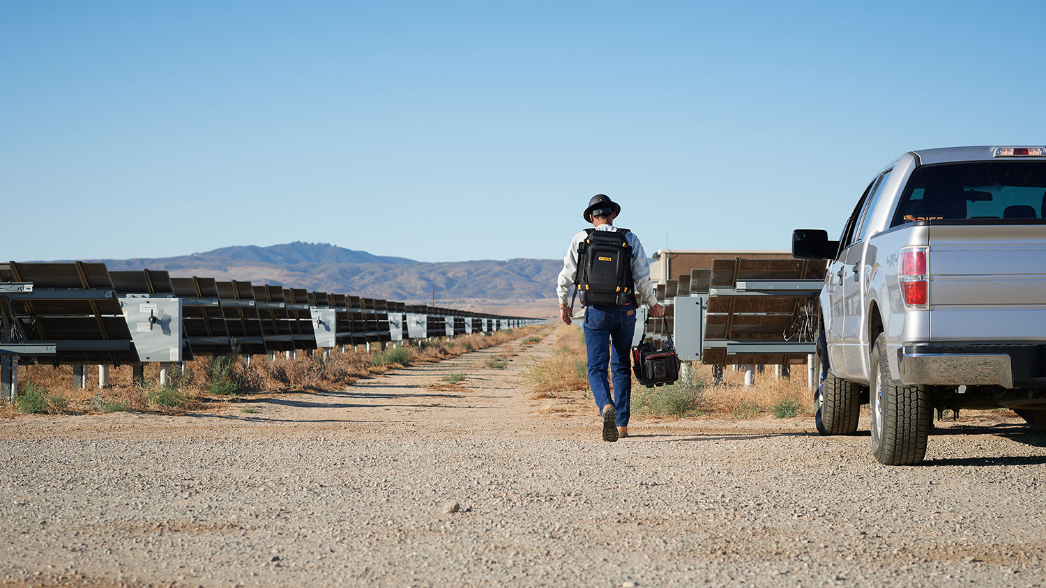 walking away solar worker