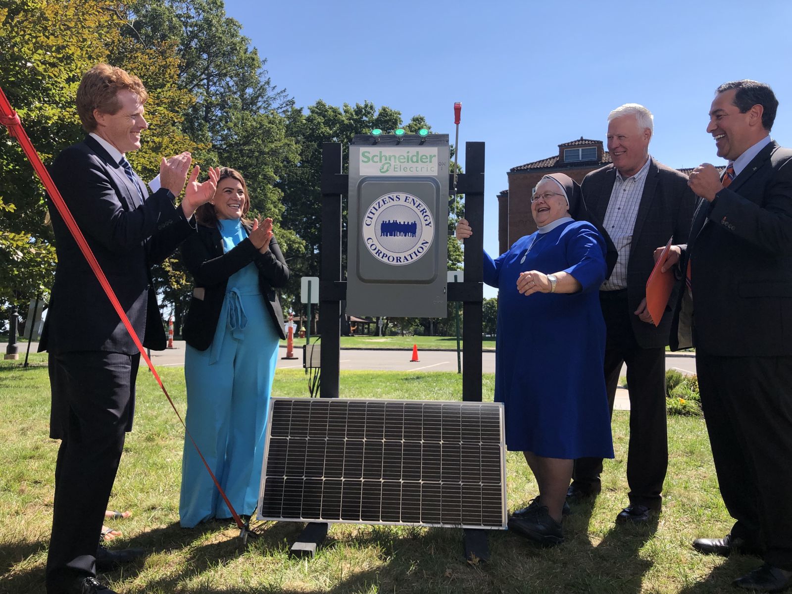 ribbon cutting with Nun