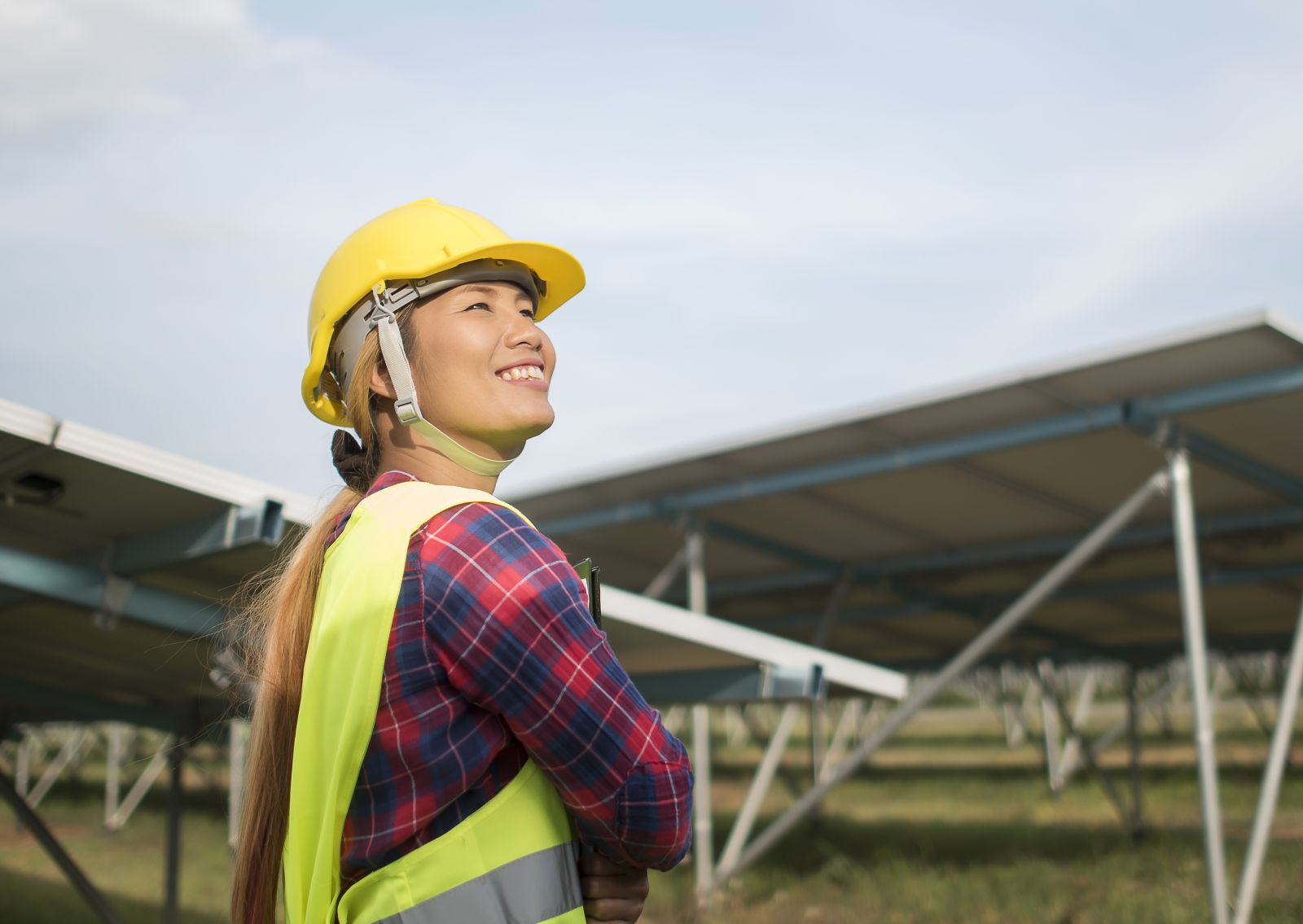 woman yellow hard hat