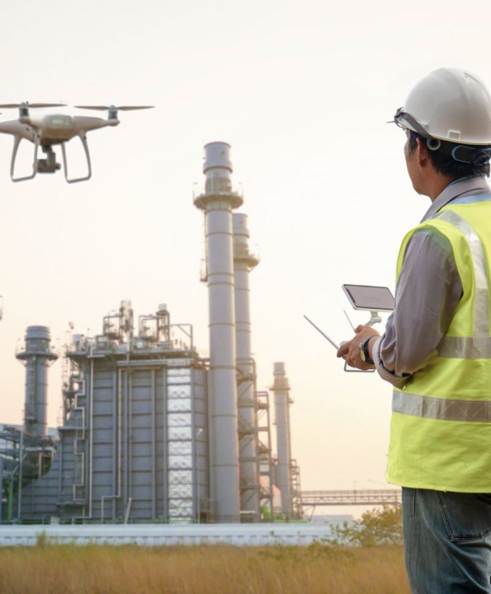 man flying drone