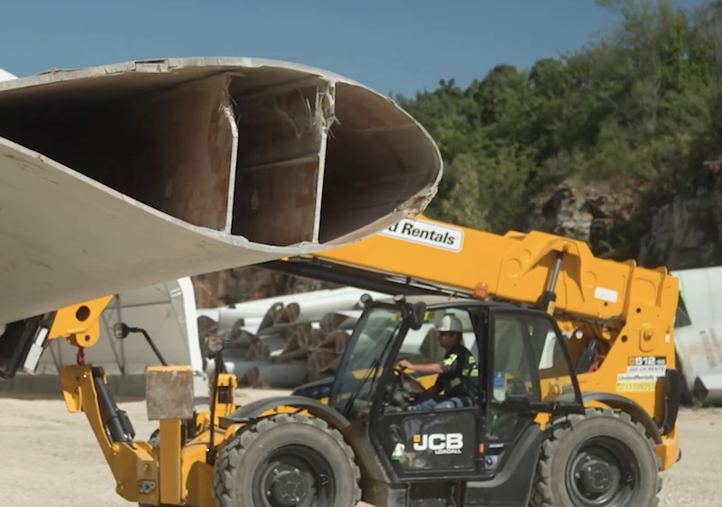 old wind turbine on yellow machine