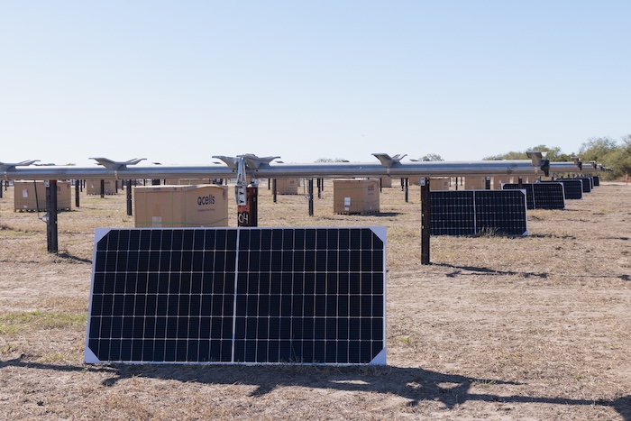 solar panels in dirt field