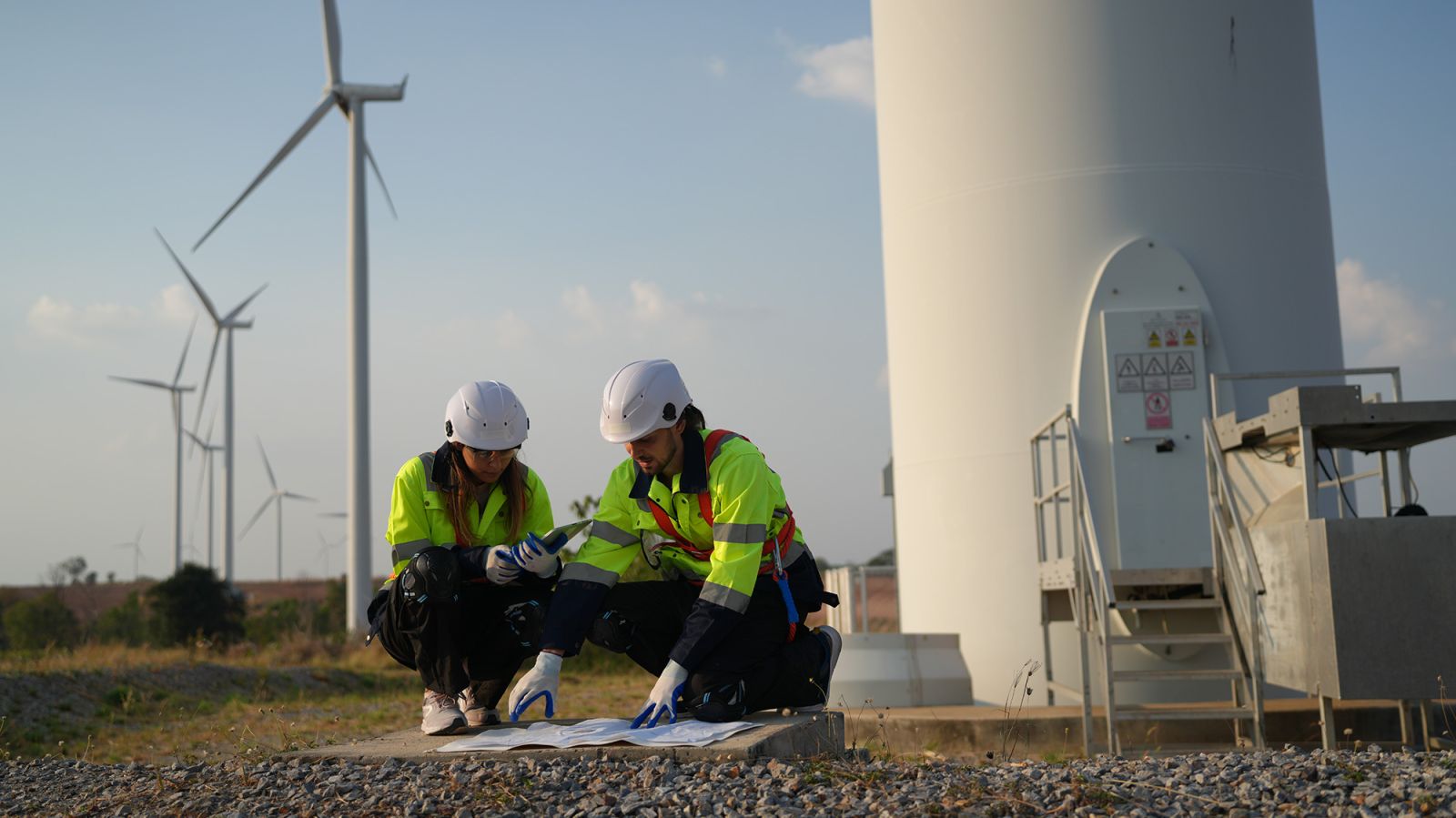 crouching at base of turbine