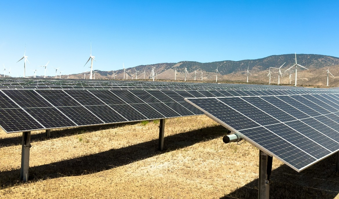 kern county CA solar with wind in background