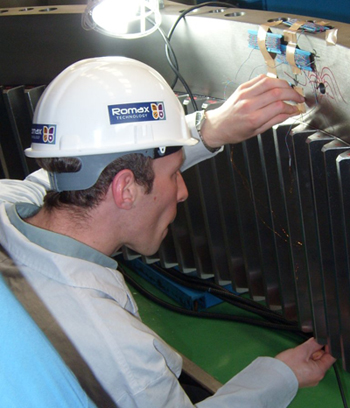 Hard at work: An engineer installing instrumentation into a gearbox for testing