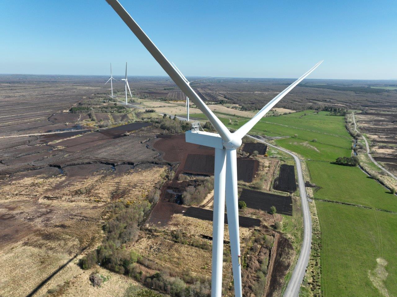 pretty wind turbine blue sky shot