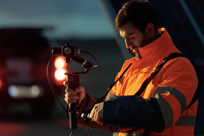 man illuminated by light