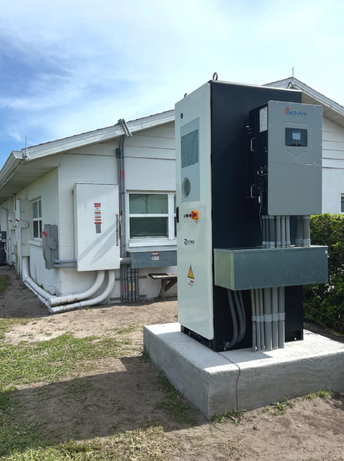 behind battery combiner box