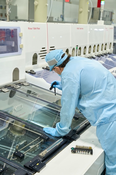 blue lab coat worker