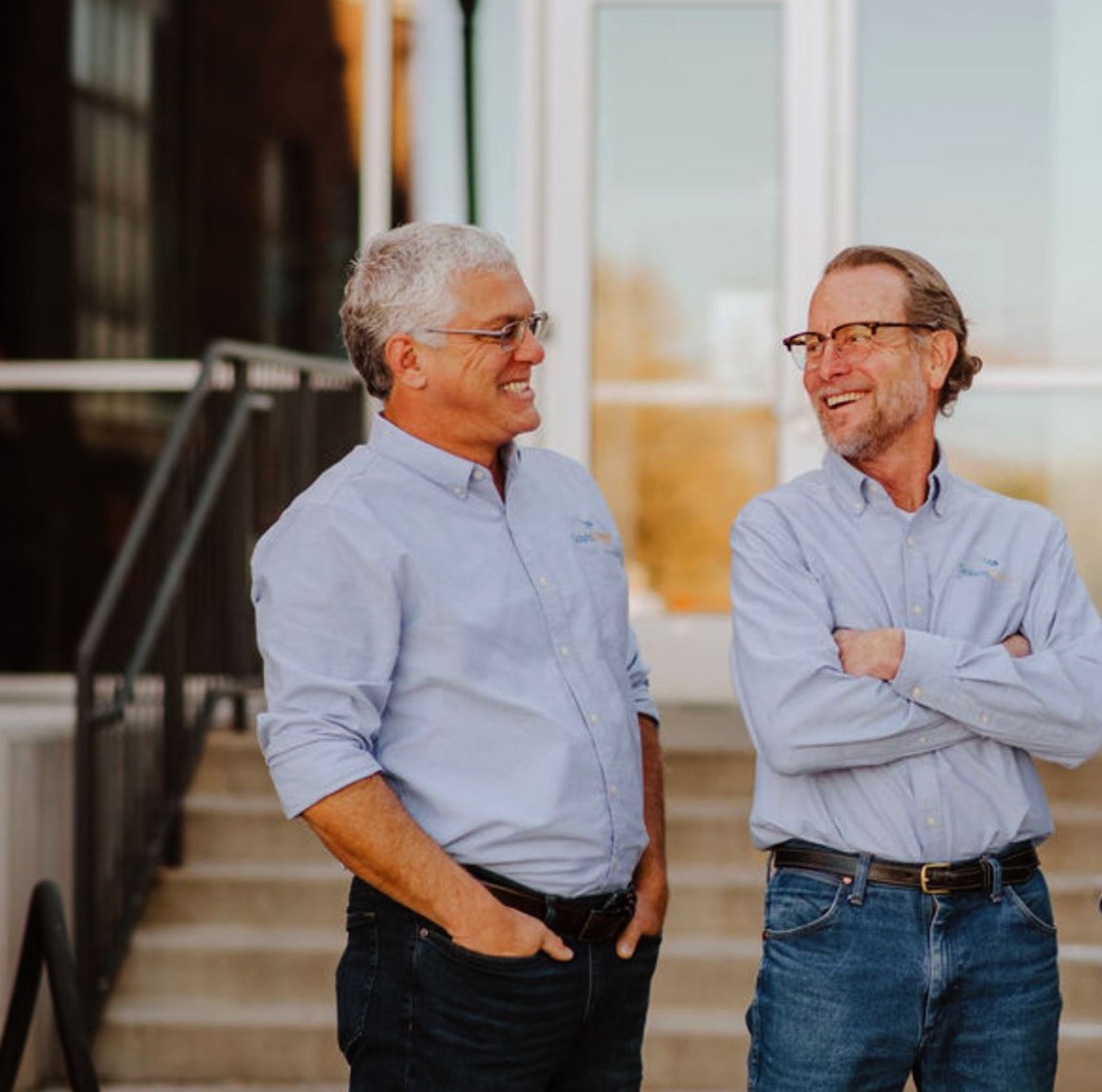 men in jeans laughing