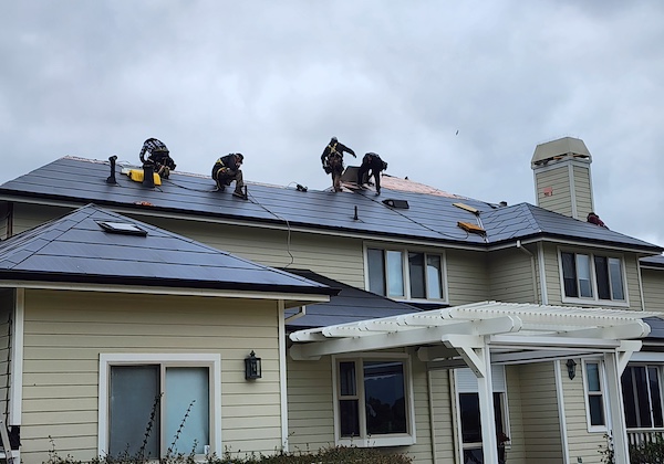 workers on a roof