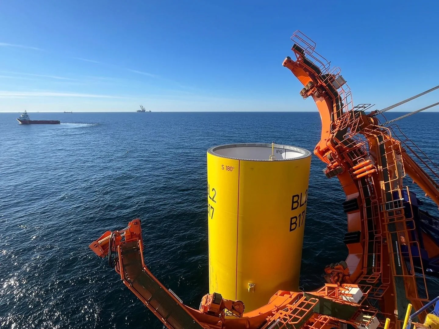 yellow pole in ocean
