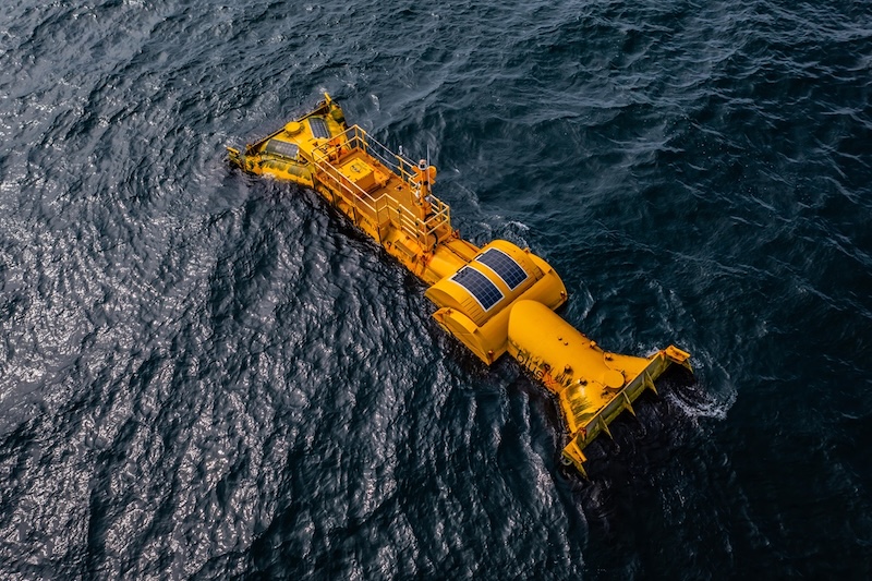 yellow machine in ocean