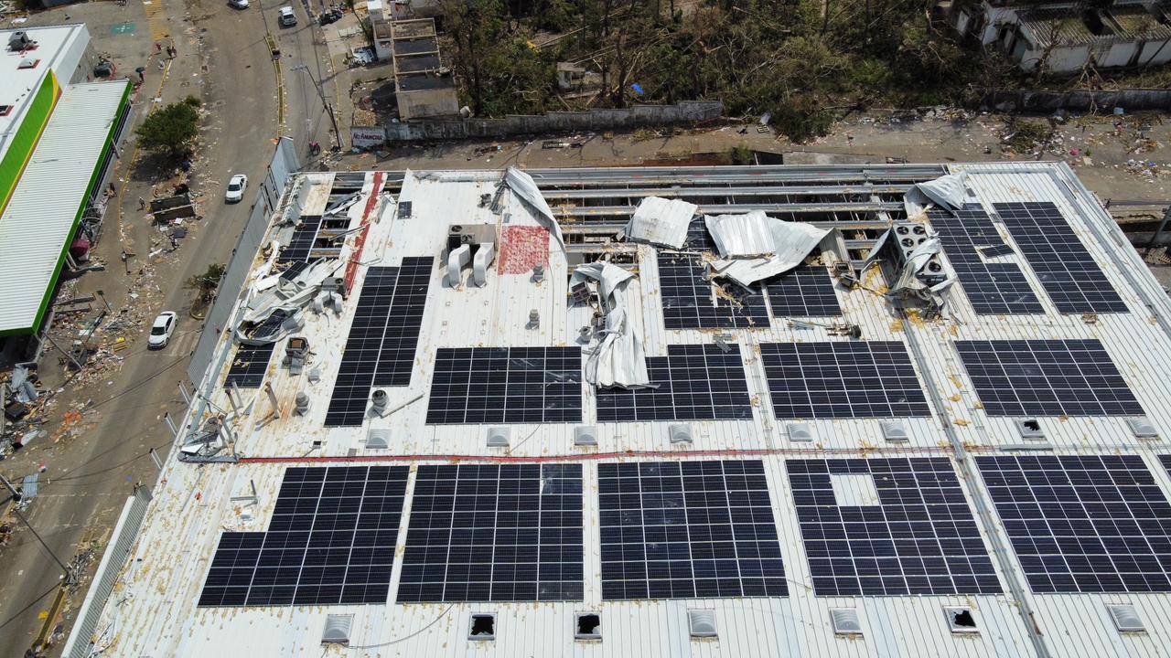 Pressures to Point Loads:  How Solar Impacts Rooftop Wind Dynamics