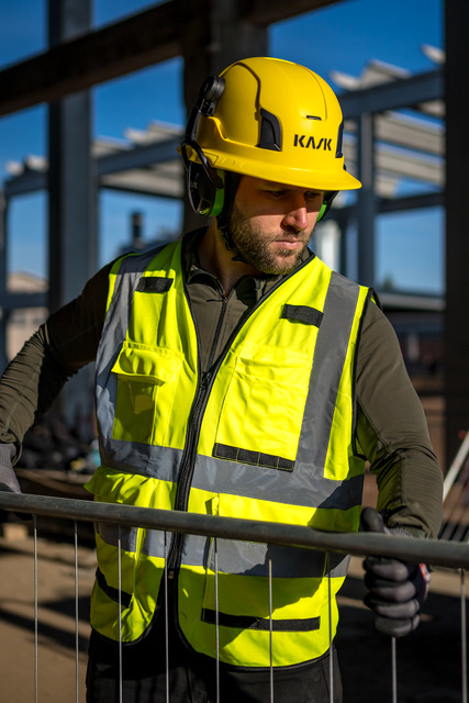 Safety helmet with flexible, full brim coverage